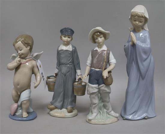 Three Lladro figures and a Nao figure